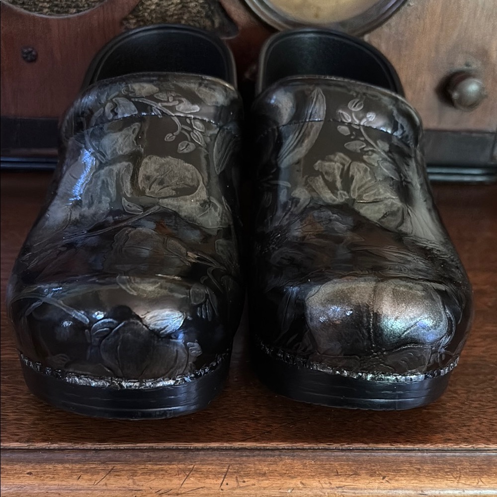 Dansko Black Floral Clogs